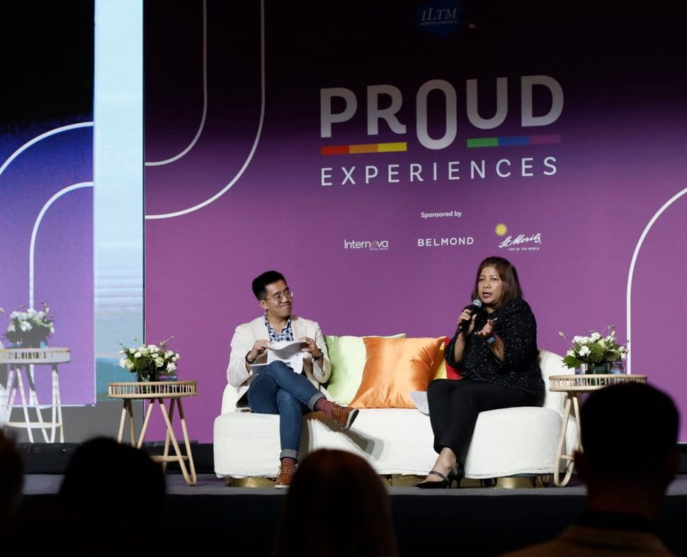 Chris Dong moderating a panel at ILTM